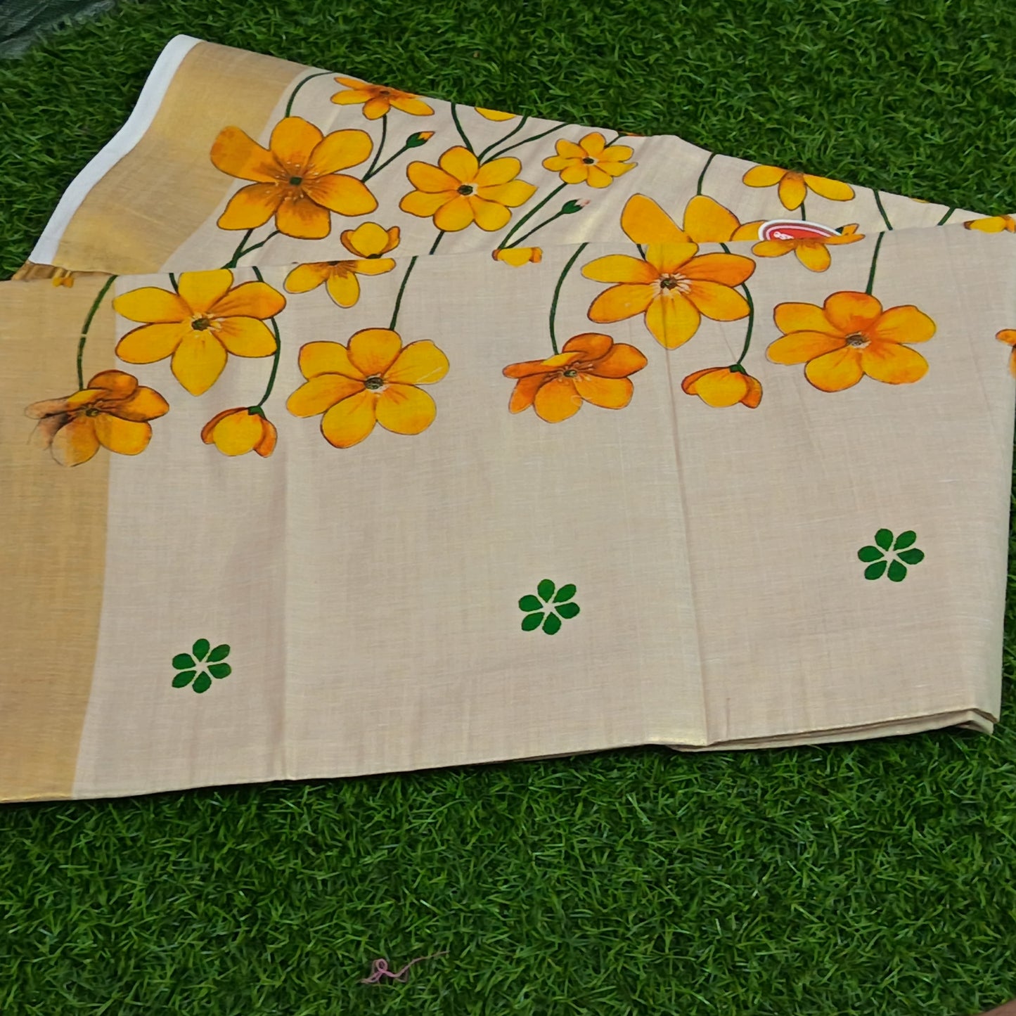 Kerala Kasavu Saree with Hand-Painted Marigold Florals & Gold Zari Border