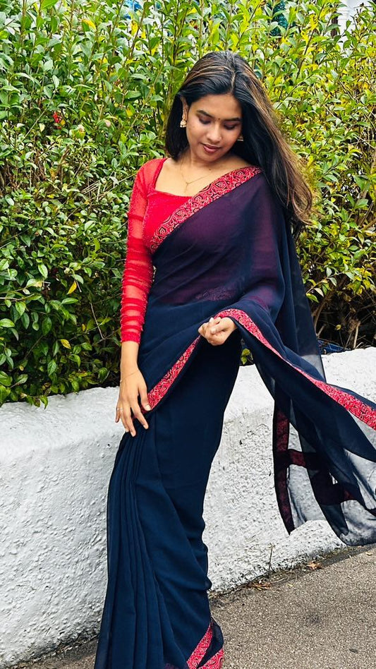 Saree with stitched Blouse.