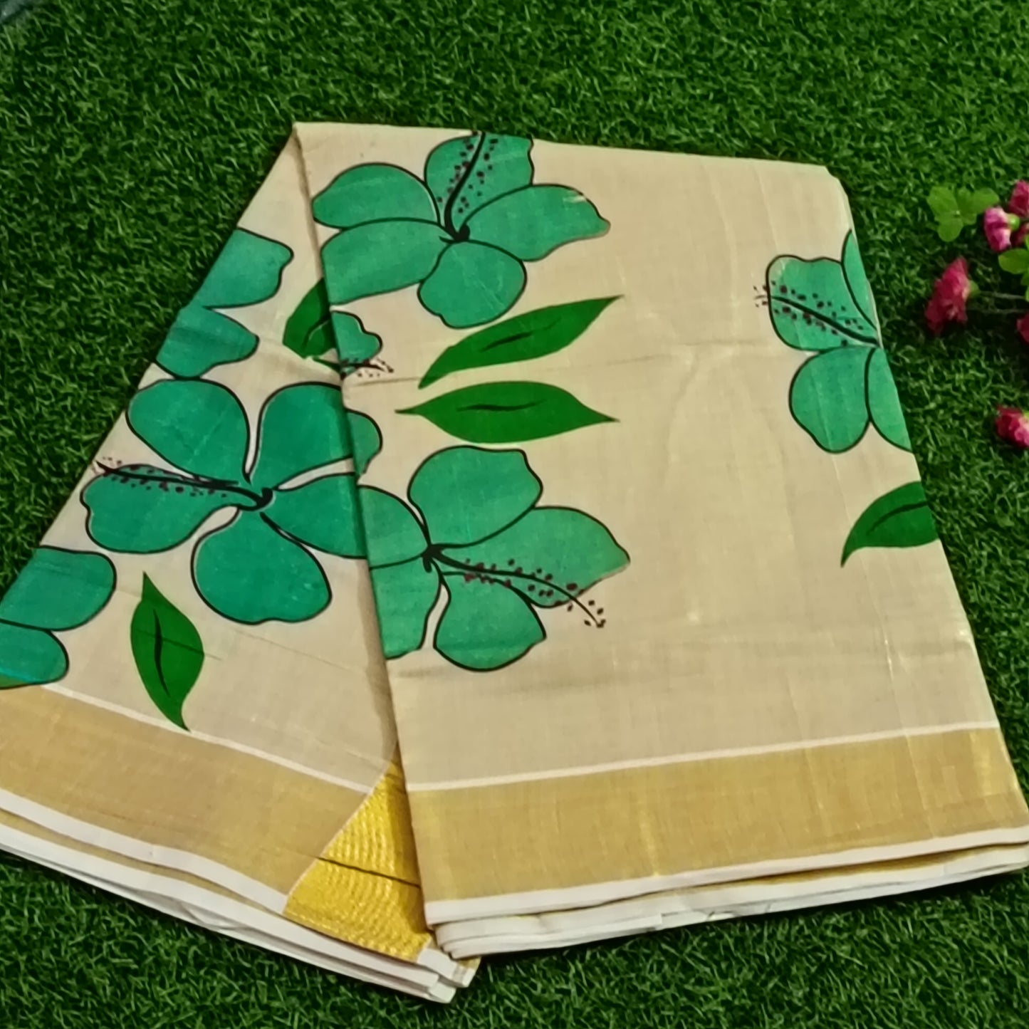 Kerala Tissue Saree with Hand-Painted Hibiscus & Gold Zari Border