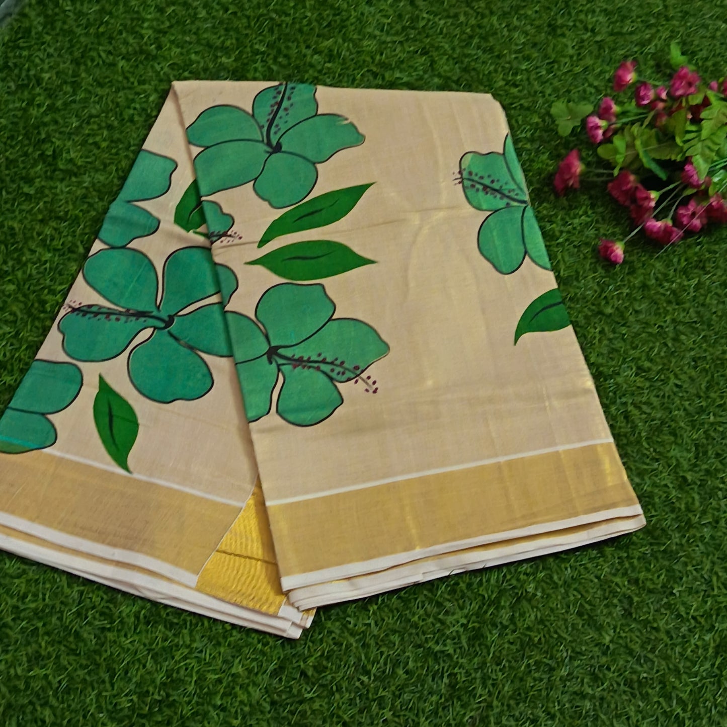 Kerala Tissue Saree with Hand-Painted Hibiscus & Gold Zari Border